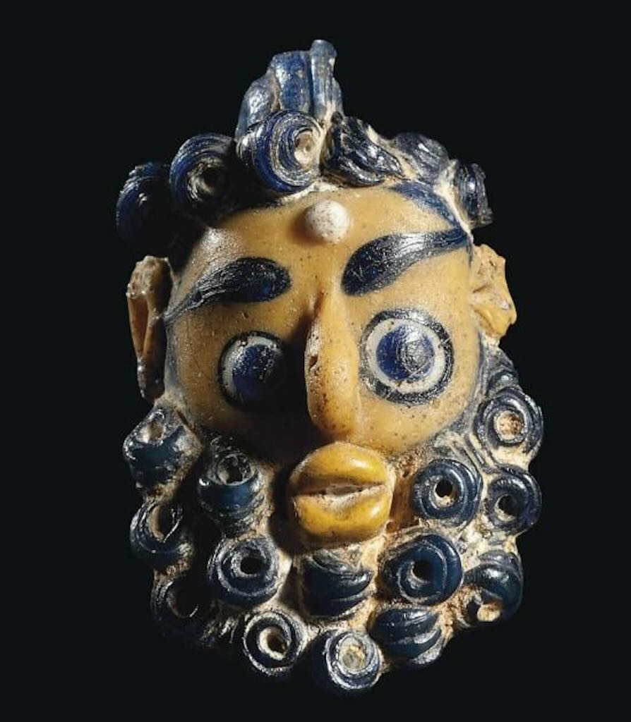 Arthaginian glass head pendant